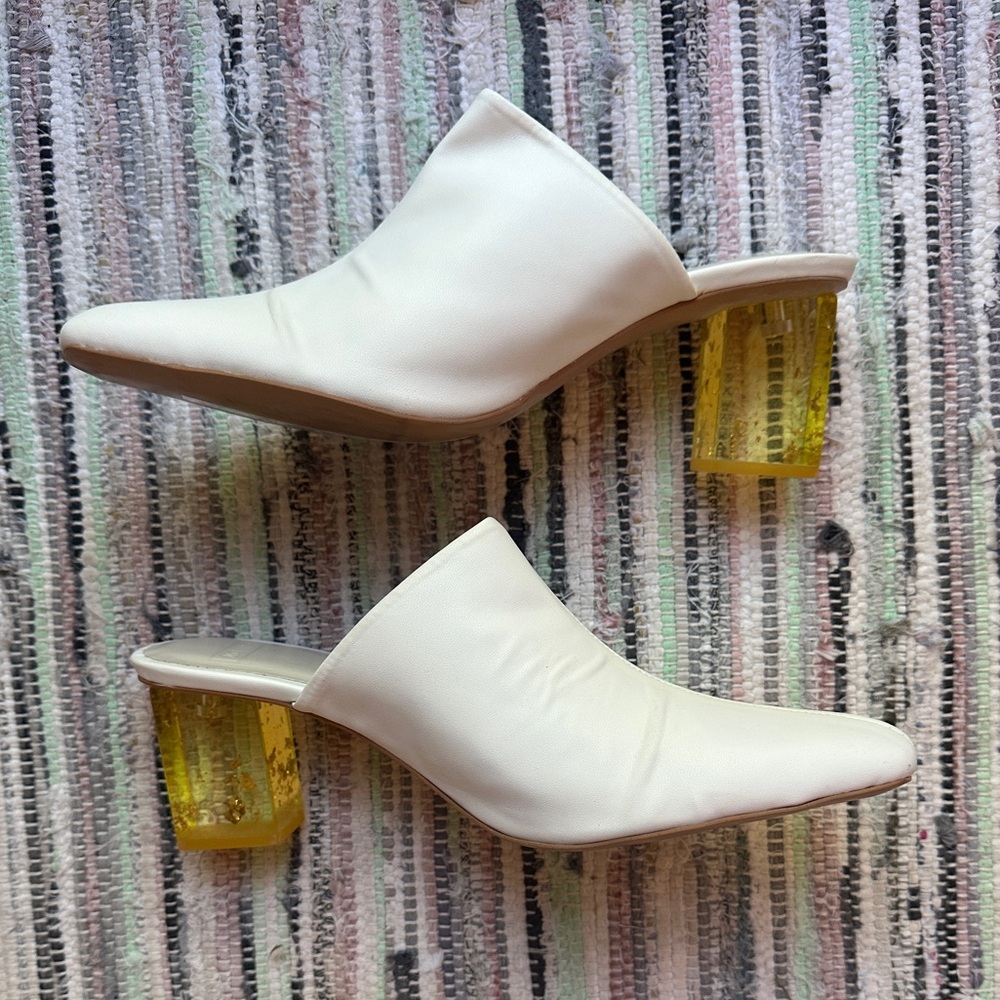 Nomia “Flavia White Mules with Amber Heels